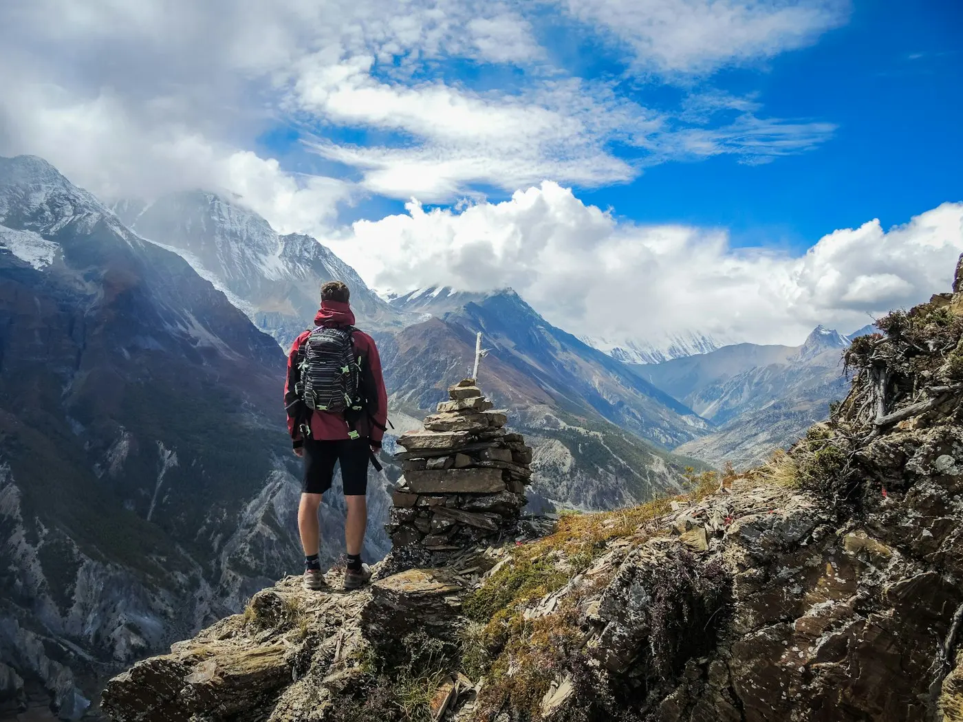 A traveller looking across a mountain range